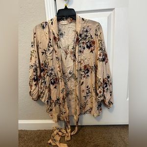 35. Altar’d state Pink floral wrap blouse